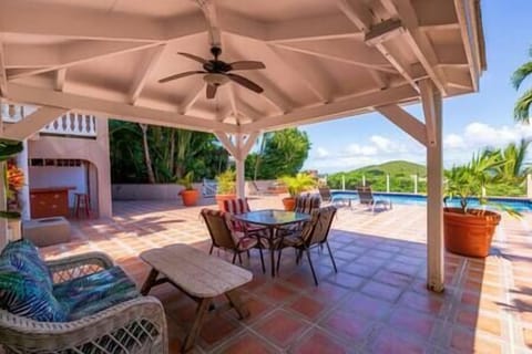 Shared spacious pool, deck and tiki bar.