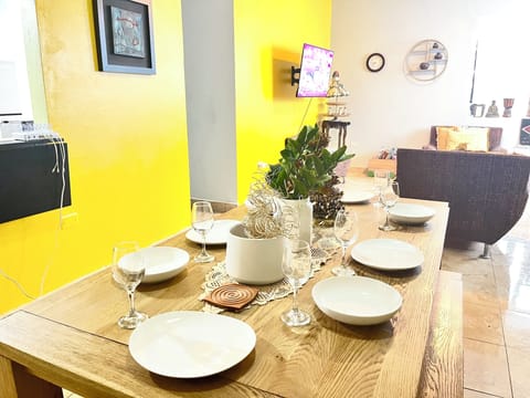 Dining room table is right off the kitchen and is open to the living room.