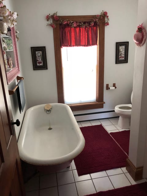 Separate tub and shower, free toiletries, hair dryer, slippers