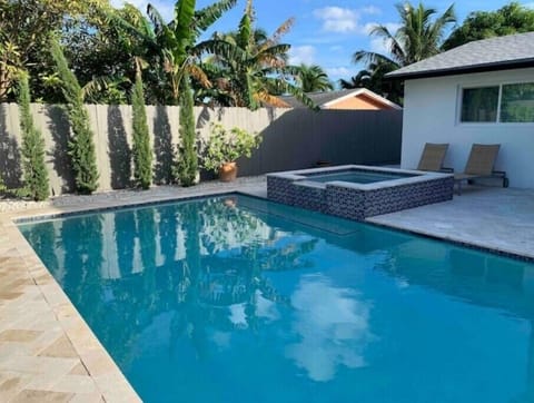 Private Japandi-style retreat with heated saltwater pool&spa near Delray Beach.