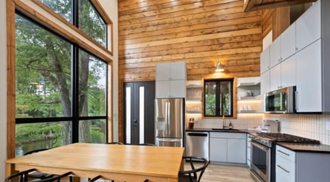 Whip up delicious meals in this modern kitchen with great views.
