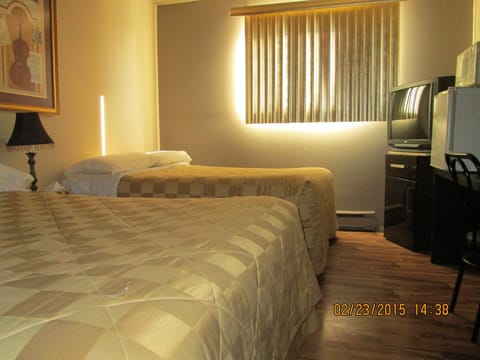 Standard Quadruple Room, 2 Double Beds | Individually decorated, individually furnished, desk, laptop workspace
