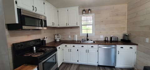 Limited cabinet space but we've put all the dishes and pots and pans we can in!