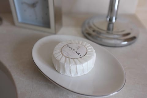 Designer toiletries, hair dryer, bathrobes, towels