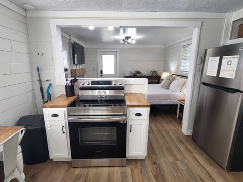 Full size stove and a few pots and pans provided