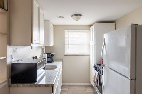 Prepare your favorite dishes in this fully equipped kitchen, furnished with all essential cooking utensils