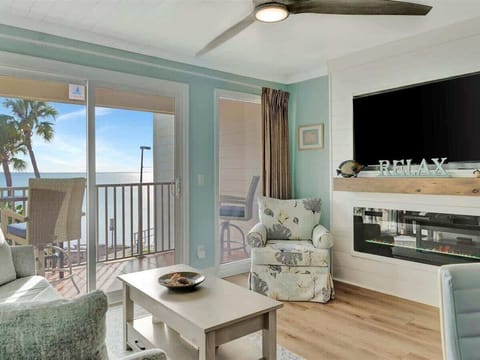 Cozy up with a movie by the fireplace, or simply gaze at the stunning ocean views