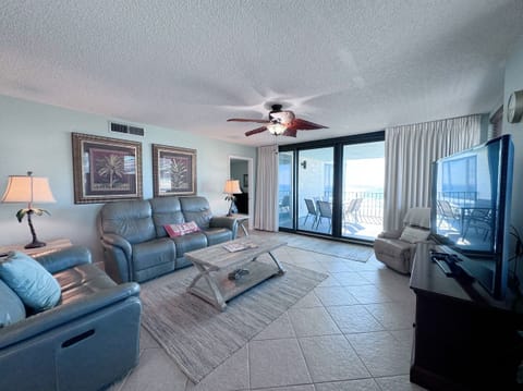 Spacious Living Area with Reclining Furniture and Smart TV, 3rd Floor