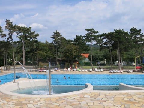 Water, Sky, Cloud, Swimming Pool, Azure, Tree, Outdoor Furniture, Shade, Leisure, Resort Town
