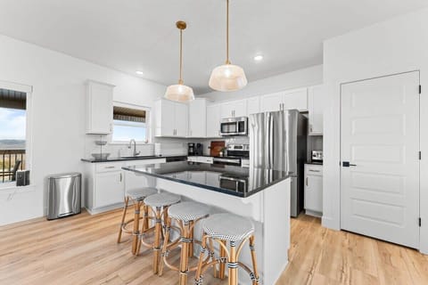 Enjoy the extra counter space and island as you setup your meals.