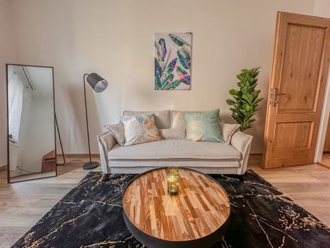 Banana Forest Room with a comfortable sofa to rest. 