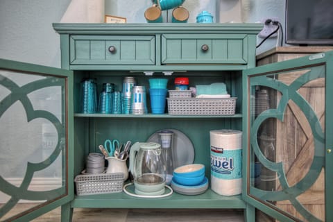 Includes basic dishes and glassware—perfect for a light continental breakfast.