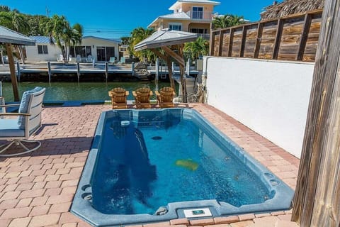 Cool off in your private plunge pool surrounded by tropical landscaping and peaceful waterfront ambiance.