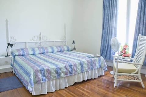 The 2 single beds can be pushed together to make a king bed