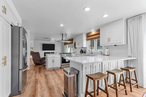 Additional seating is available at the island.