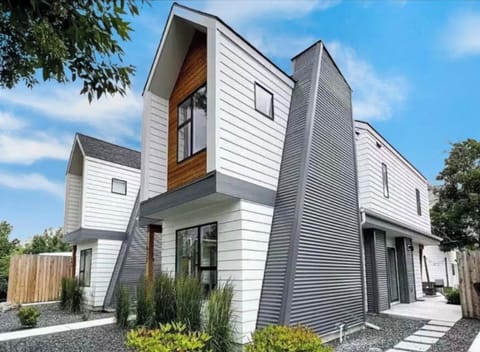 Modern bliss. Now newly fenced back and side yards for additional privacy.