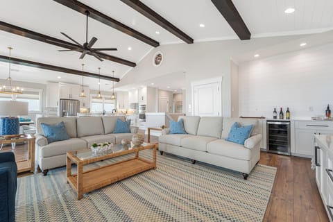 Comfortable main living room with bar area.