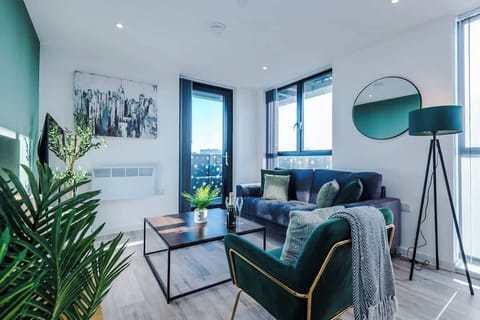 The open-plan living room, dining area and kitchen benefit from a 50-inch Smart TV, a 4-seater dining table, plenty of space to sit down in the evenings and a sizable wrap-around balcony.