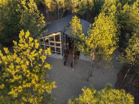Aerial view of Alpenglow cabin nestled in the woods