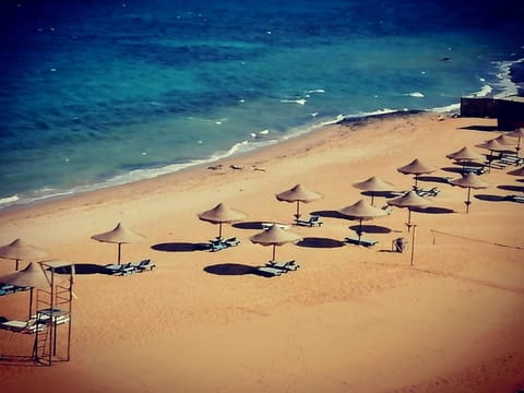Private beach, sun loungers, beach umbrellas, beach towels