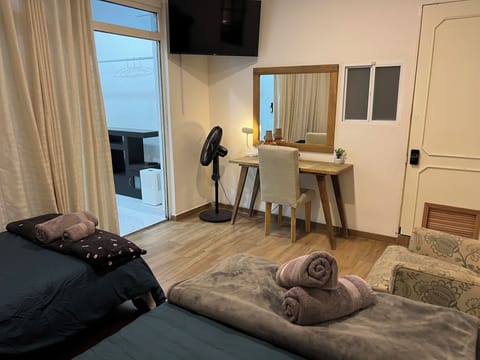 Signature Twin Room, Multiple Beds | Desk, laptop workspace, WiFi (free), individually decorated