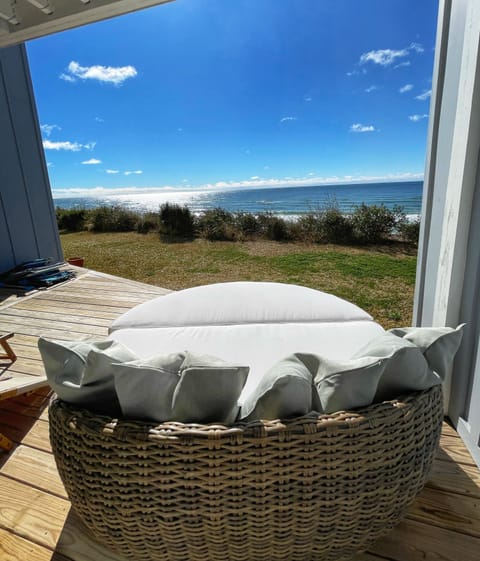 Sunbathe on the daybed outside when you’re not feeling like being in the sand!