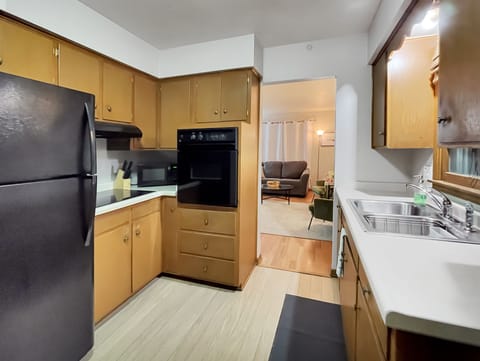 Large kitchen leading to living space