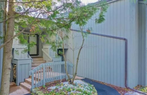 Condo entrance upstairs to the right (2 sets of stairs outside w/ 10 + inside)