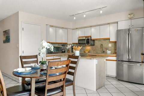 Tile flooring in the kitchen and dining area