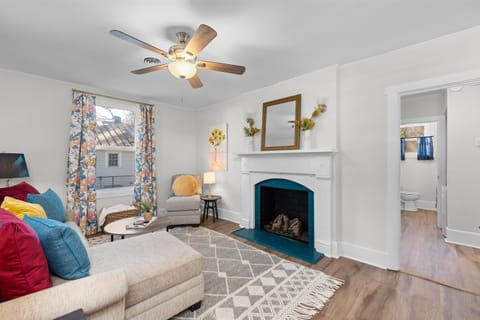 Living room with Smart Tv and gas log fireplace 