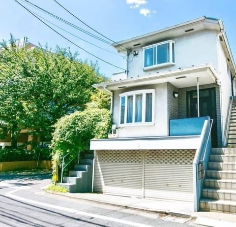 Traditional Japanese house in a peaceful residential area. 