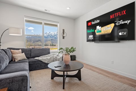Enjoy majestic mountain vistas or watch TV on our 85" smart TV.