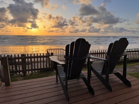 Private deck with ocean views, perfect for relaxing with coffee or wine