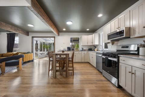 Bright kitchen with ample counter space and everything you need to cook.