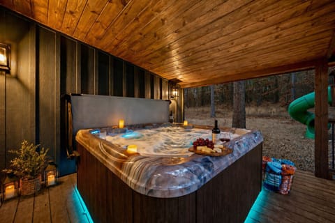 Private covered hot tub — perfect for relaxing day or night