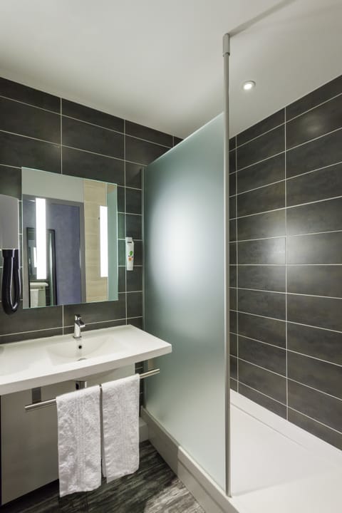 Eco-friendly toiletries, hair dryer, towels