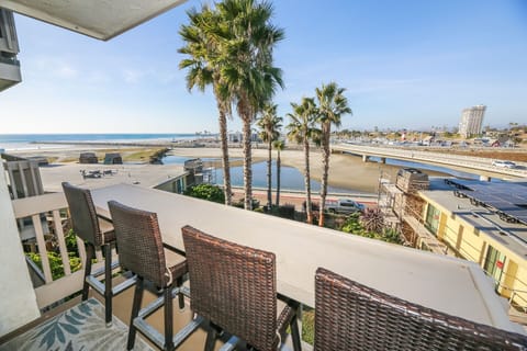 Iconic lighthouse, charming shops, and endless ocean blues – all from your private balcony.