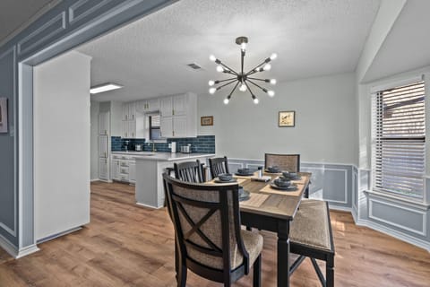 Share meals and memories around the spacious dining table.