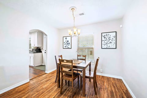 Dining Area: Enjoy meals in a bright, stylish space with lovely art and inviting natural light!