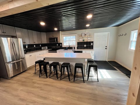 kitchen with 8 barstools