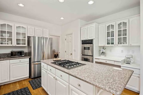 The kitchen has excellent supplies and bountiful counter space.