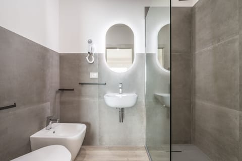 Standard Room, 1 Bedroom | Bathroom | Shower, rainfall showerhead, free toiletries, hair dryer