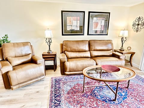 Reclining sofas and chair.