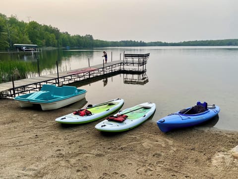 Private sand beach with a shallow swimming area.