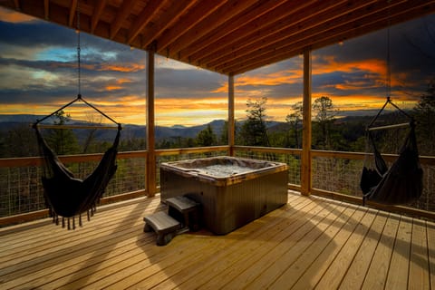 Hot tub vibes, porch swings, and mountain views.