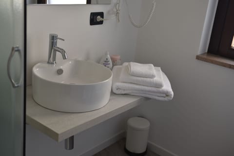 Exclusive Apartment | Bathroom | Shower, rainfall showerhead, free toiletries, hair dryer