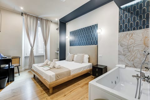 Executive Room | Premium bedding, down comforters, iron/ironing board, free WiFi