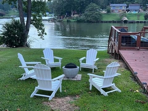 Gather around the fire pit for a relaxing evening near the water.