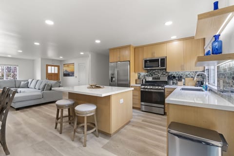 Gourmet kitchen with beautiful quartz island