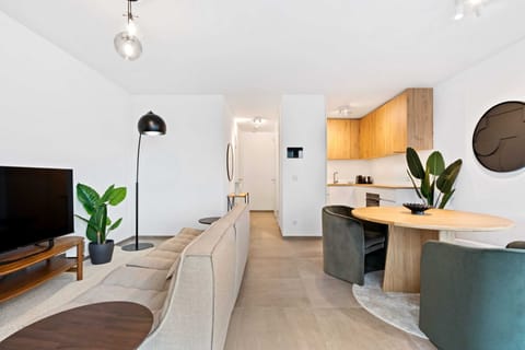 Our minimalist living room is the perfect spot to unwind and entertain.